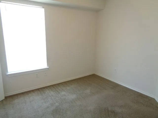 a white toilet and tub sitting next to a bath tub