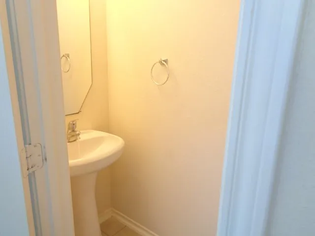 a kitchen that has a sink and a stove