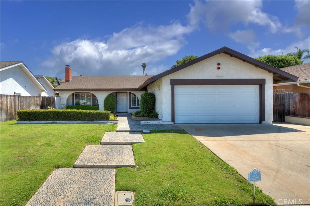 23772 Cll Hogar Mission Viejo, CA 92691 - Photo 2 of 30 a front view of a house with yard