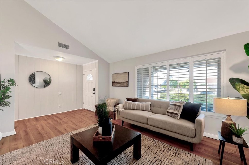 23772 Cll Hogar Mission Viejo, CA 92691 - Photo 6 of 30 a living room with furniture and wooden floor