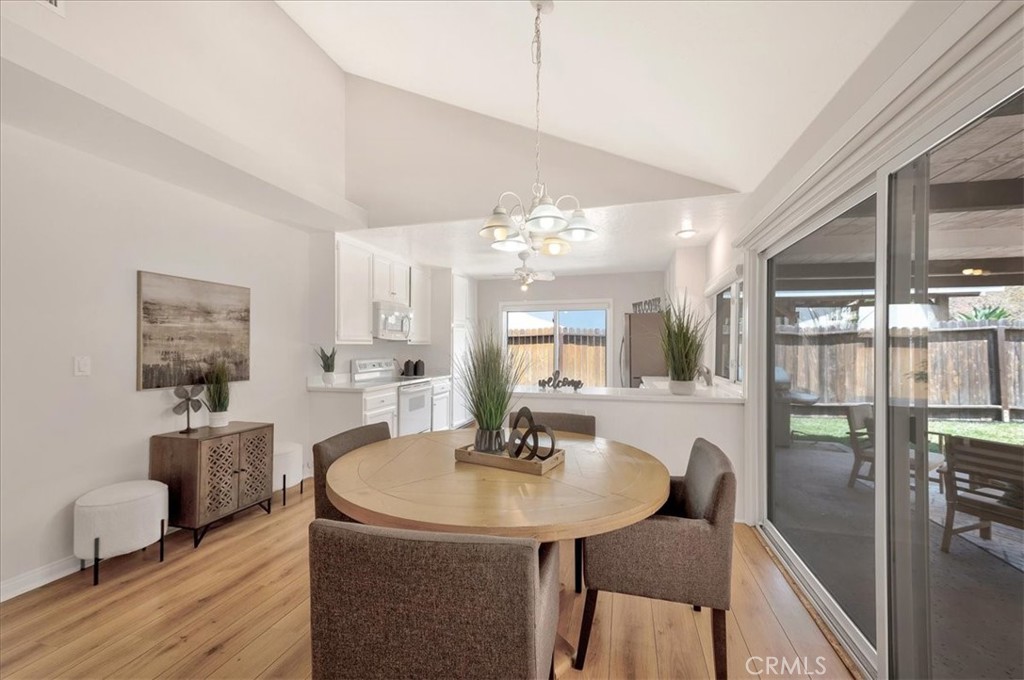 23772 Cll Hogar Mission Viejo, CA 92691 - Photo 8 of 30 a view of a a dining room with furniture window and wooden floor