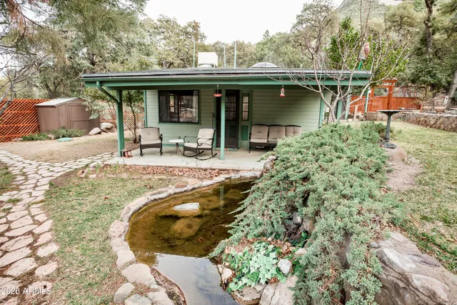 a view of a balcony with wooden floor