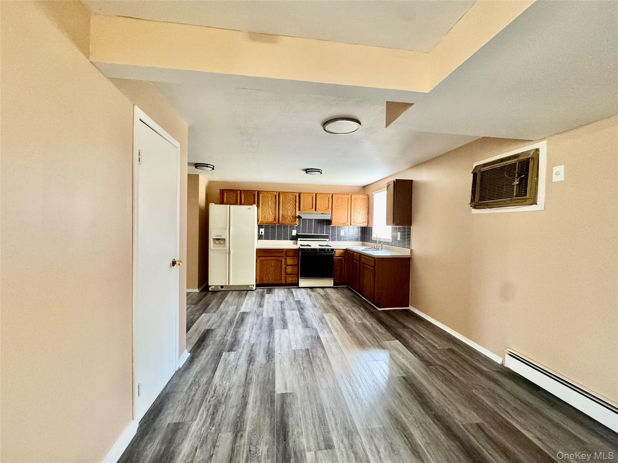 52 Boxbaum Road Sparrowbush, NY 12780 - Photo 12 of 23 a kitchen with a refrigerator and a stove