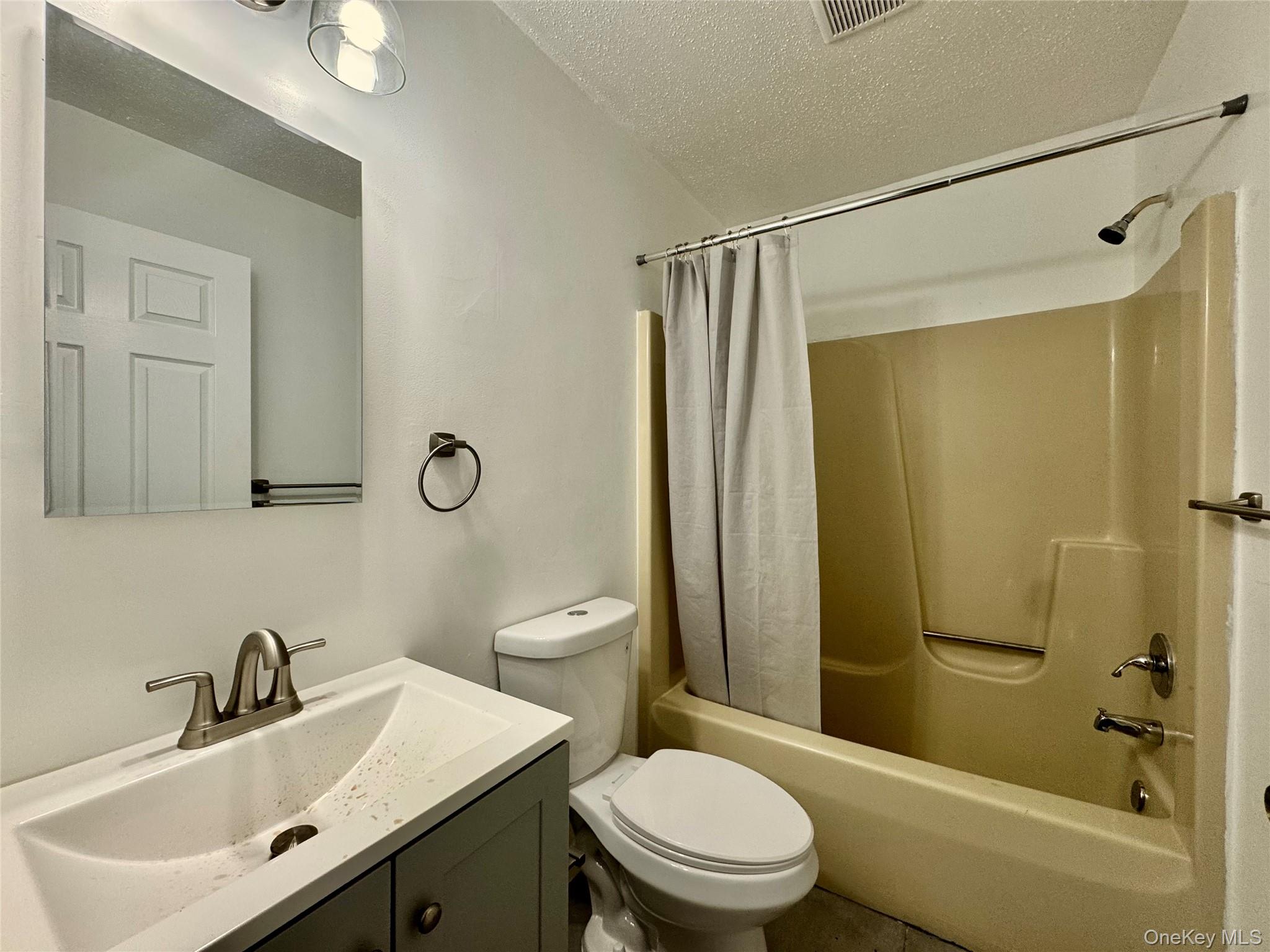 52 Boxbaum Road Sparrowbush, NY 12780 - Photo 8 of 23 a bathroom with a sink toilet and shower