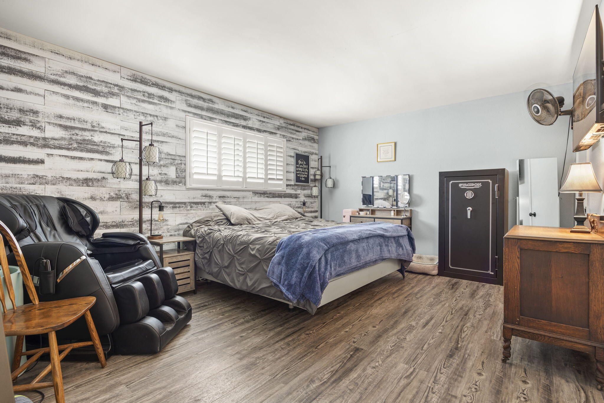 4413 Catlin Circle, Unit B Carpinteria, CA 93013 - Photo 15 of 23 a bedroom with a bed and wooden floor