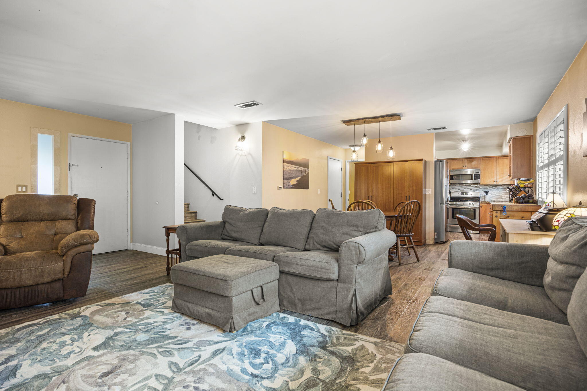 4413 Catlin Circle, Unit B Carpinteria, CA 93013 - Photo 8 of 23 a living room with furniture and a view of kitchen