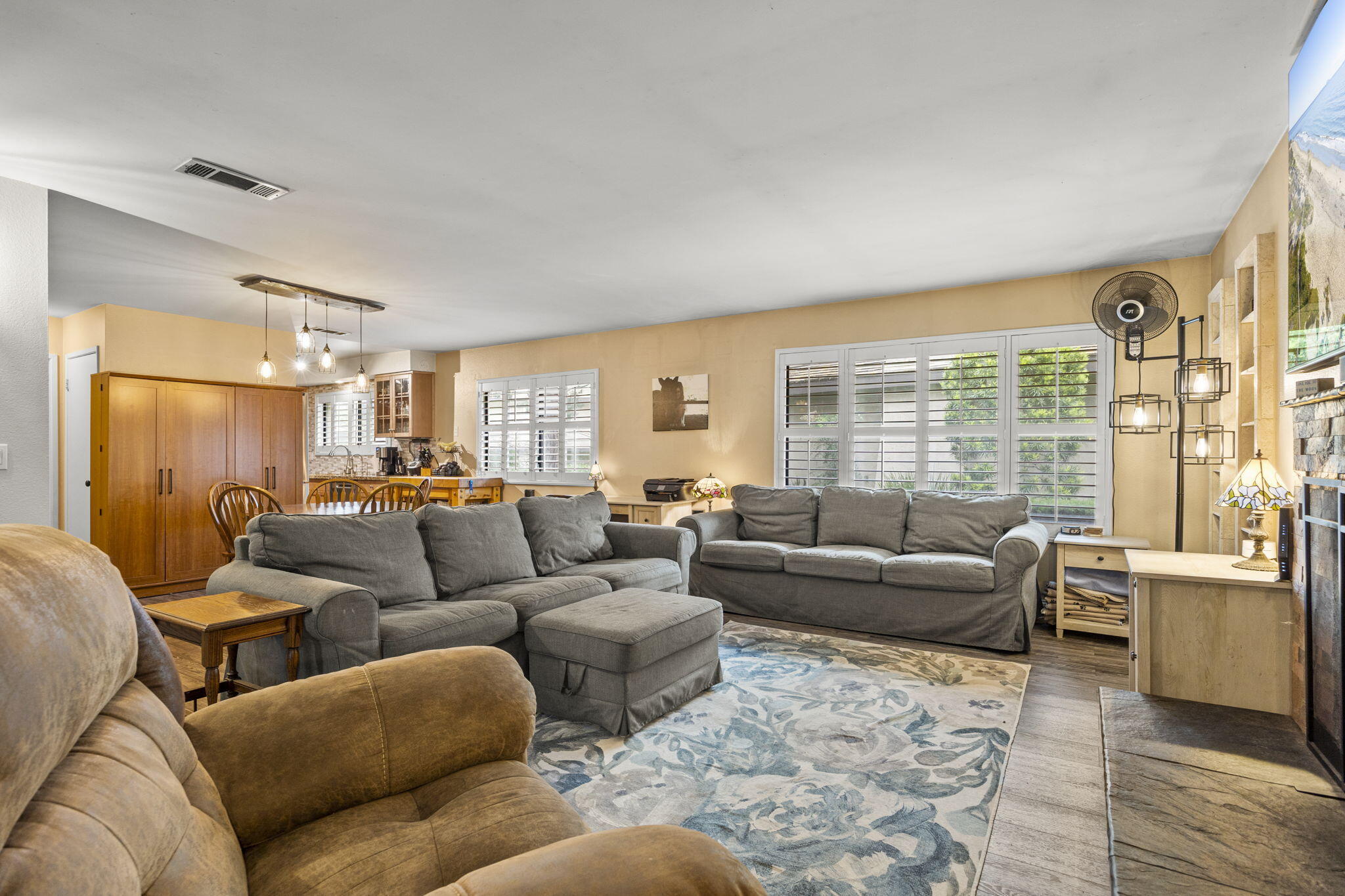 4413 Catlin Circle, Unit B Carpinteria, CA 93013 - Photo 9 of 23 a living room with furniture and a large window