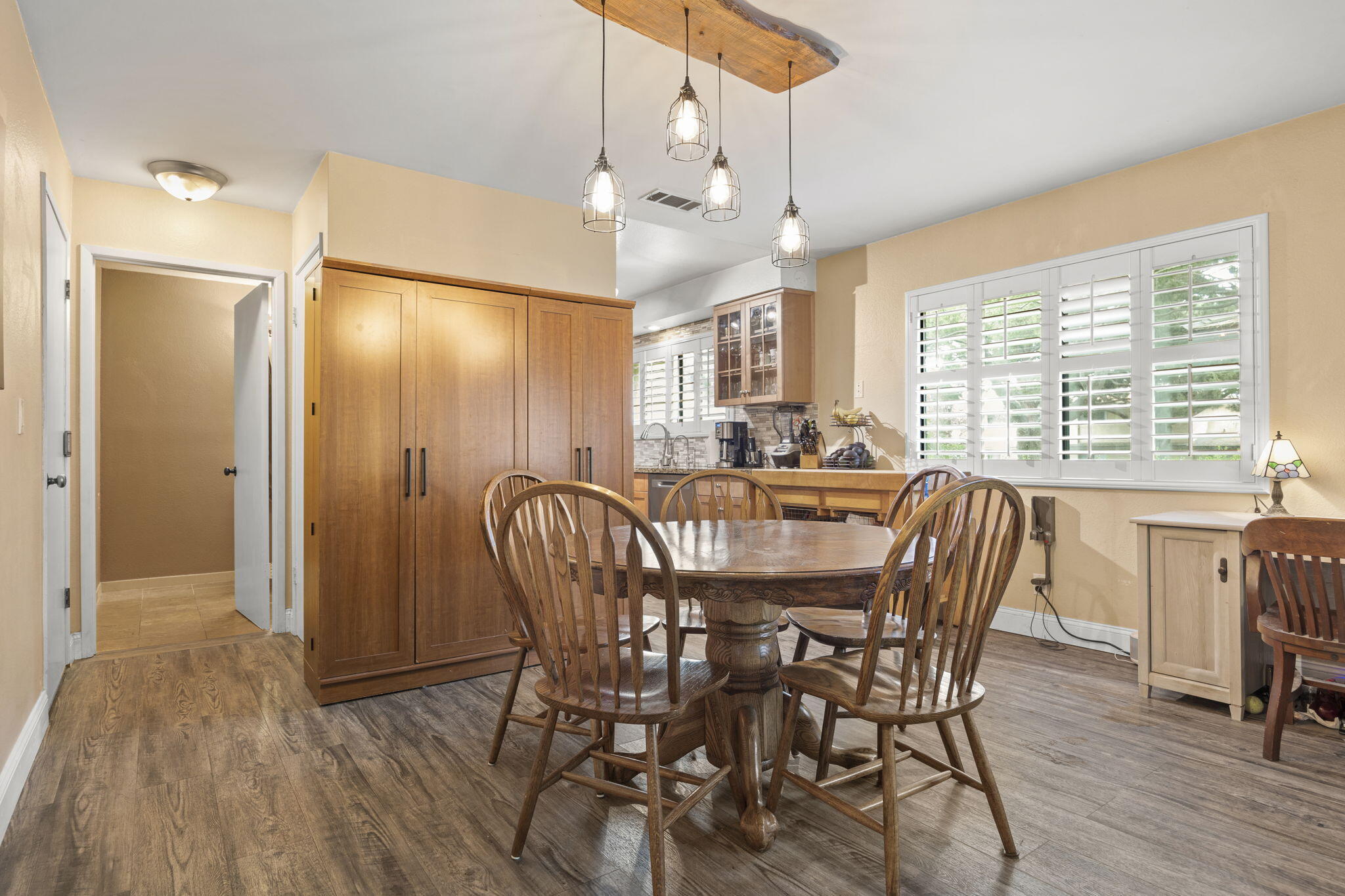 4413 Catlin Circle, Unit B Carpinteria, CA 93013 - Photo 10 of 23 a view of a a dining room with furniture window and wooden floor