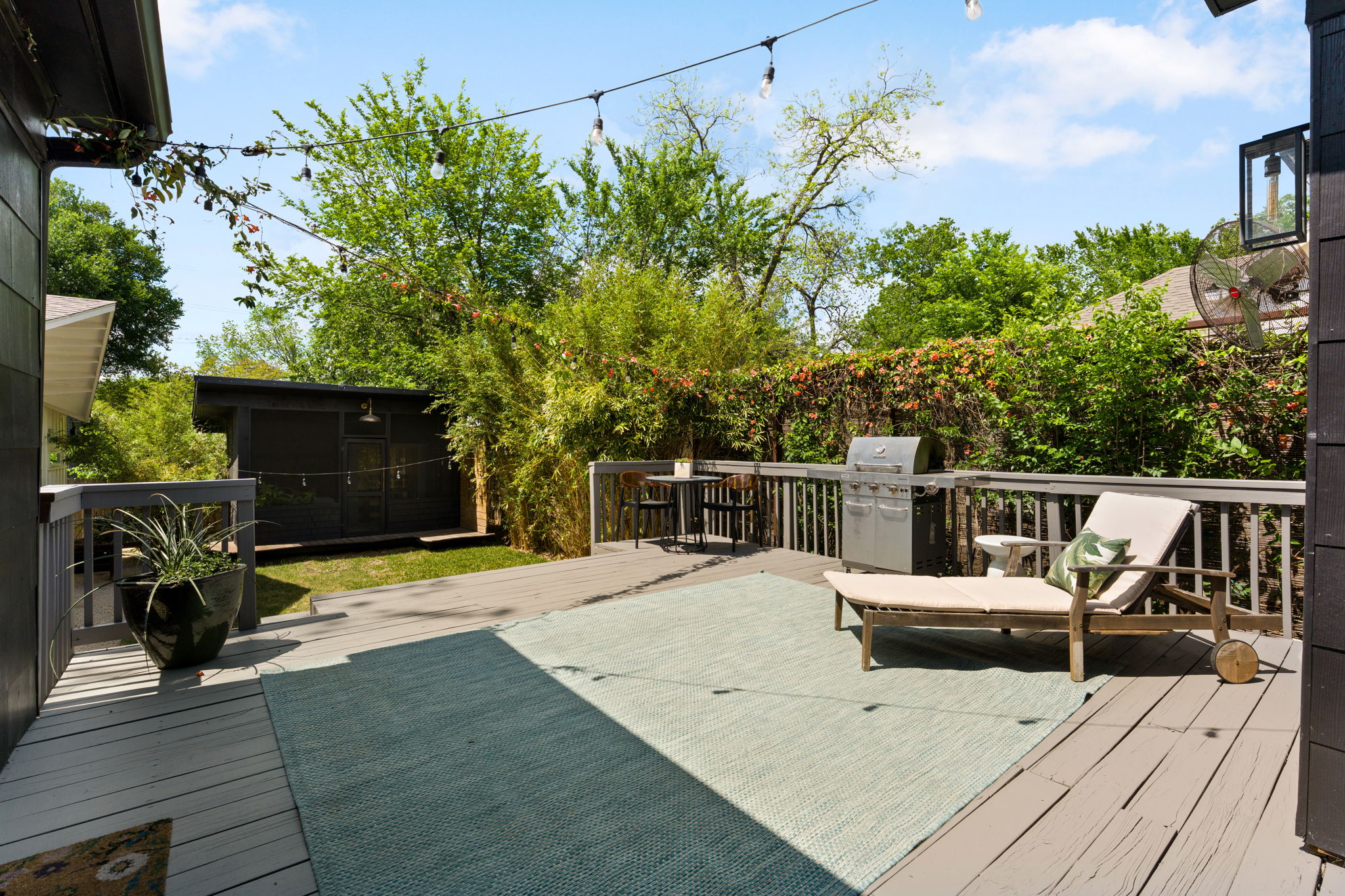 1704 Wethersfield Road Austin, TX 78703 - Photo 23 of 31 The property features an outdoor deck area, complete with a railing and string lights