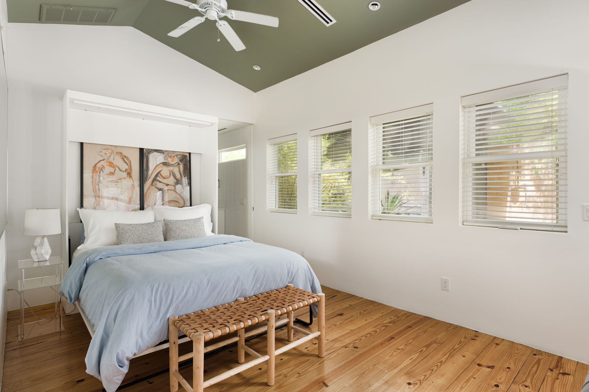 1704 Wethersfield Road Austin, TX 78703 - Photo 28 of 31 Bedroom featuring hardwood flooring, a vaulted ceiling with a ceiling fan, and multiple windows with blinds