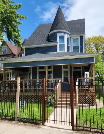 a front view of a house with a porch