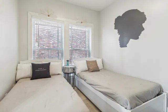 a kitchen that has a table and chairs in it