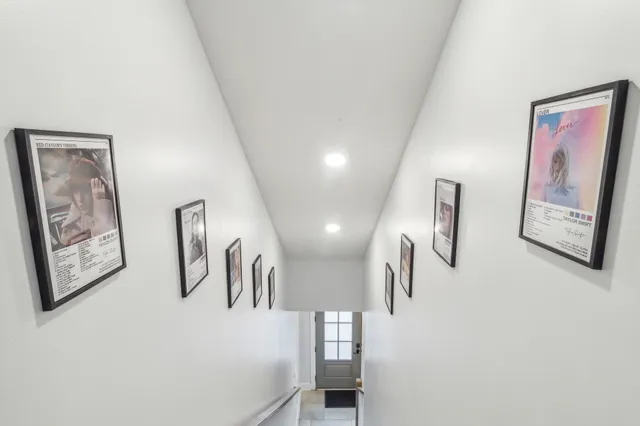 a living room with fireplace furniture and a flat screen tv