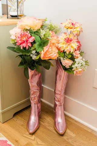 a bedroom with a large bed and a large window