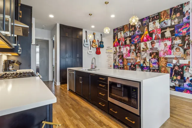a bathroom with a sink vanity and a mirror