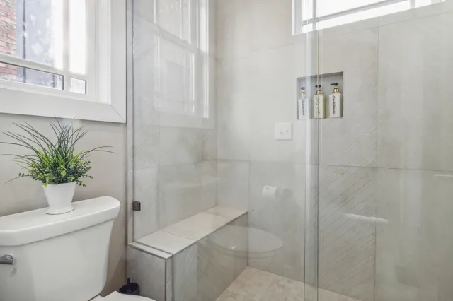 a bedroom with a bed and furniture