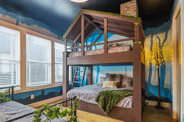 a view of swimming pool with sitting area