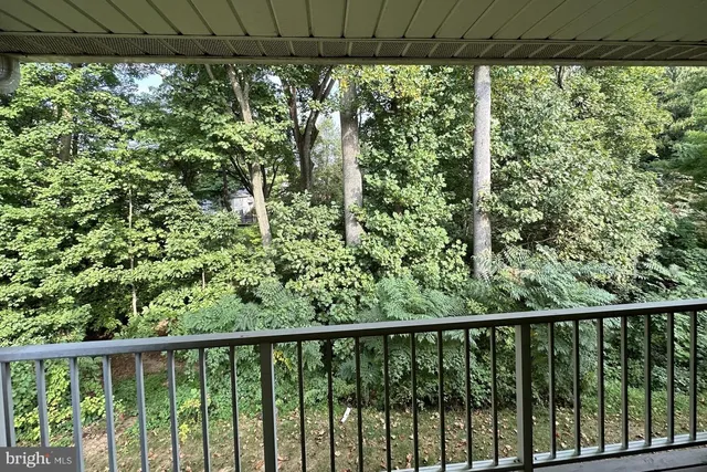 a view of a street from a balcony