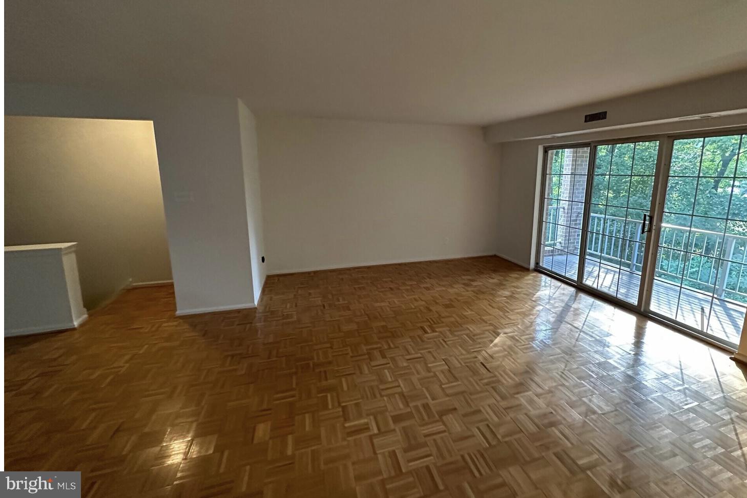 1002 Valley Glen Road, Unit 239 Elkins Park, PA 19027 - Photo 3 of 13 a view of an empty room and window