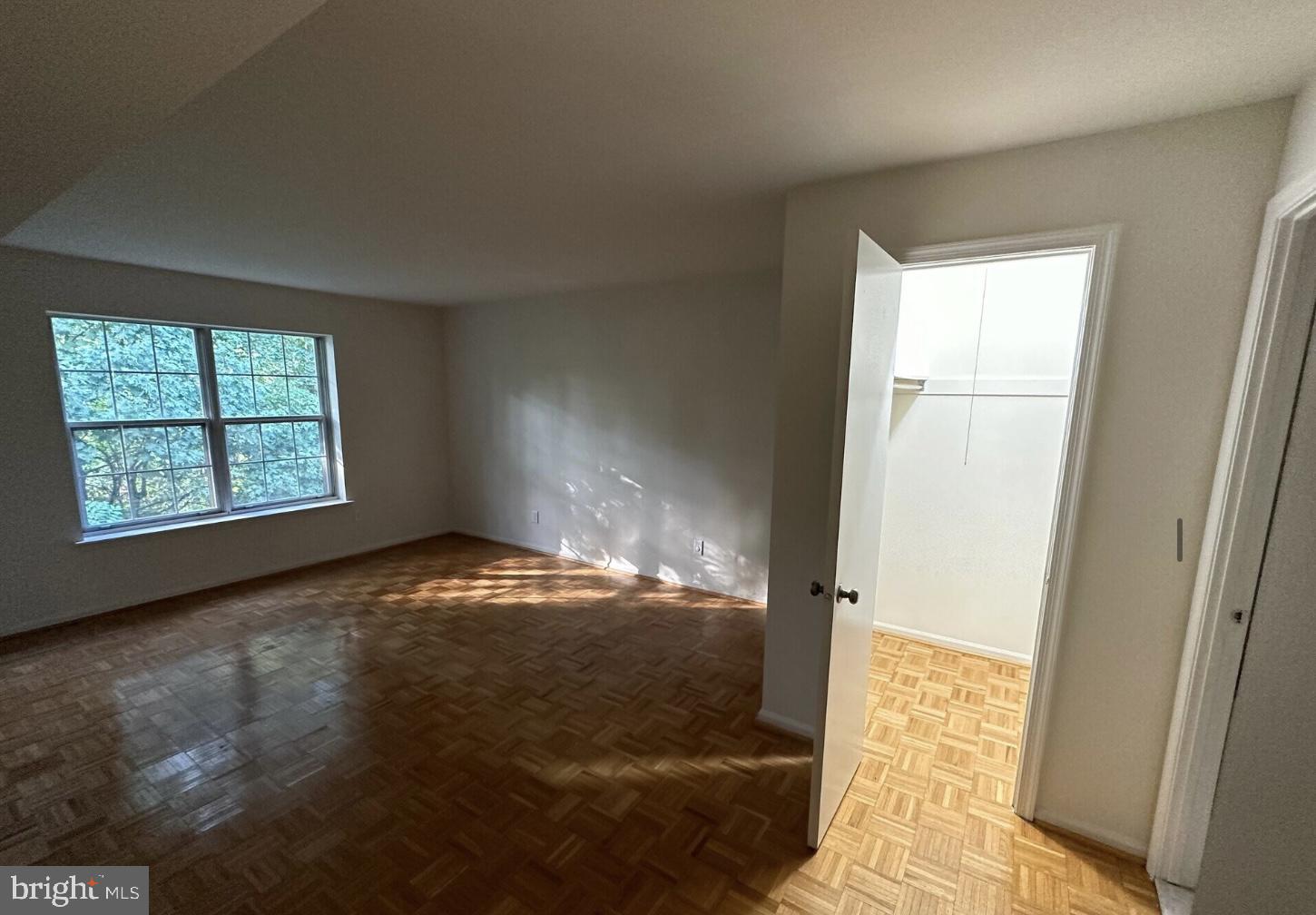 1002 Valley Glen Road, Unit 239 Elkins Park, PA 19027 - Photo 8 of 13 an empty room with windows