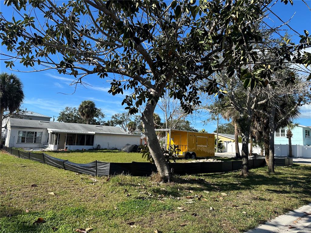 1811 2nd Street Indian Rocks Beach, FL 33785 - Photo 7 of 12 a view of a house with a yard