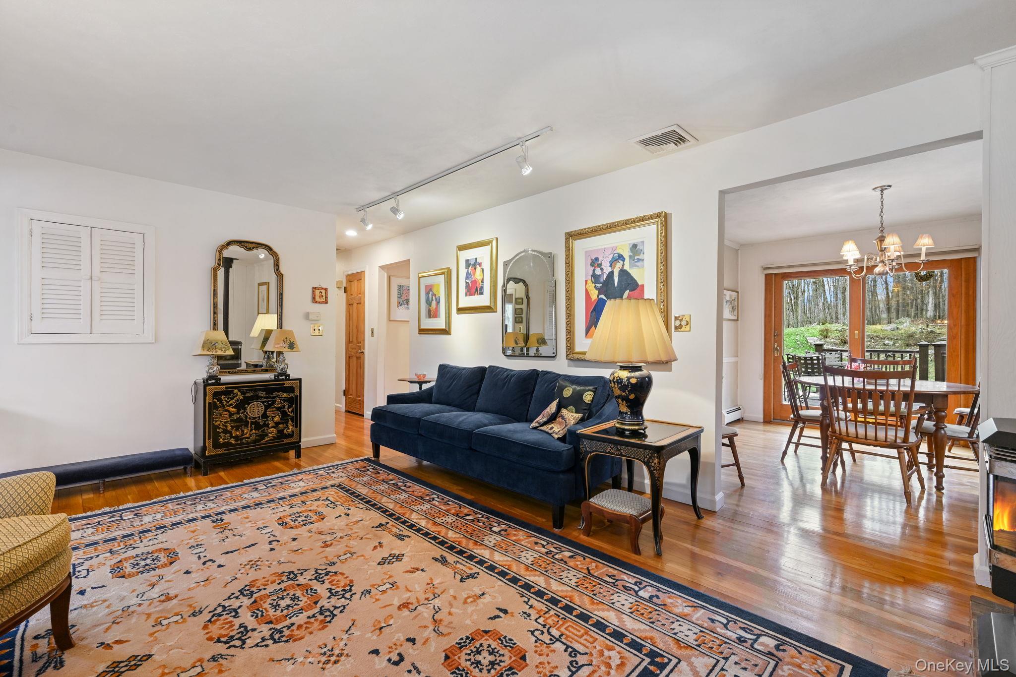 54 Lockwood Road South Salem, NY 10590 - Photo 20 of 46 a living room with furniture and wooden floor