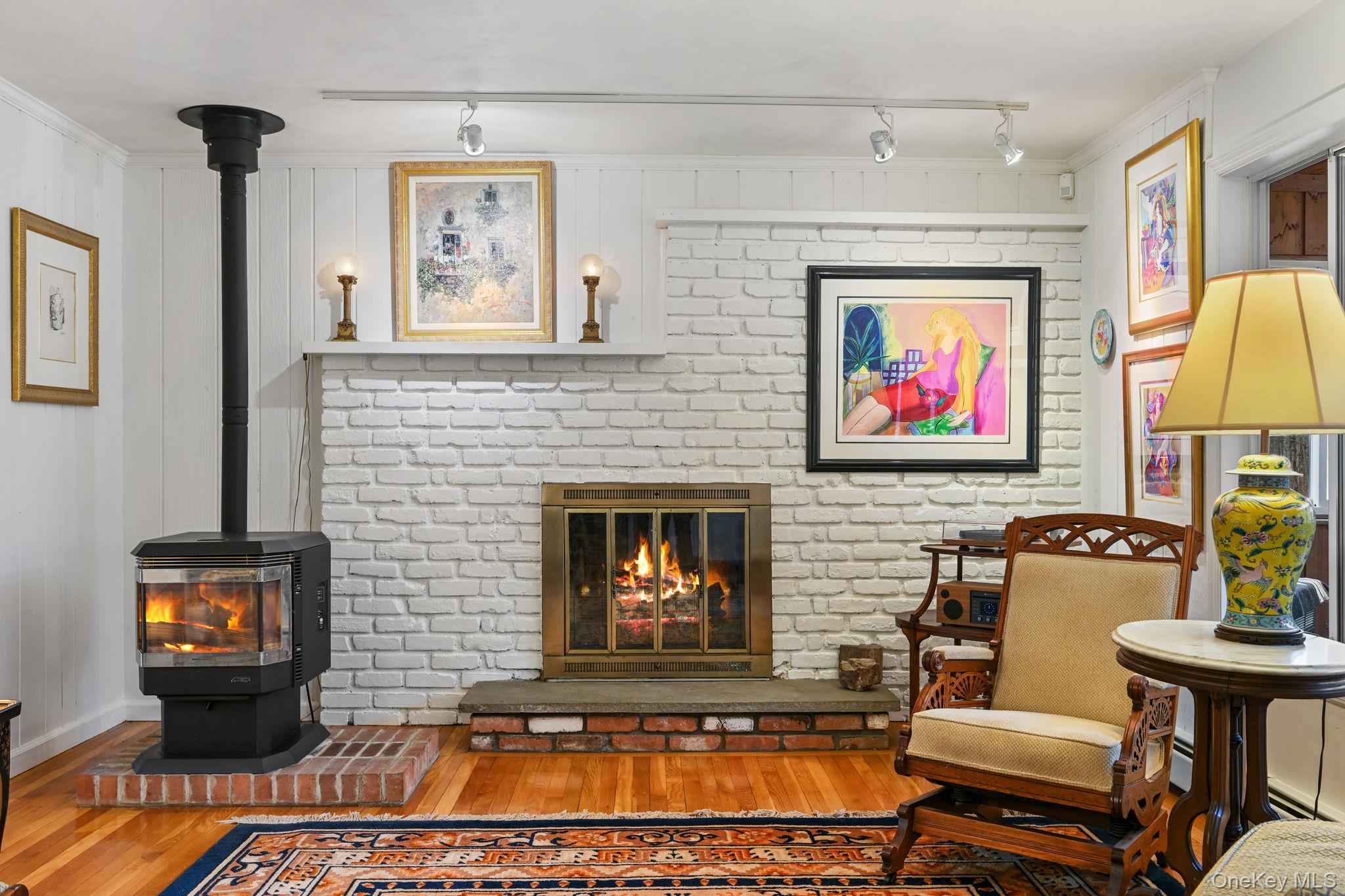 54 Lockwood Road South Salem, NY 10590 - Photo 21 of 46 a living room with furniture and a fireplace