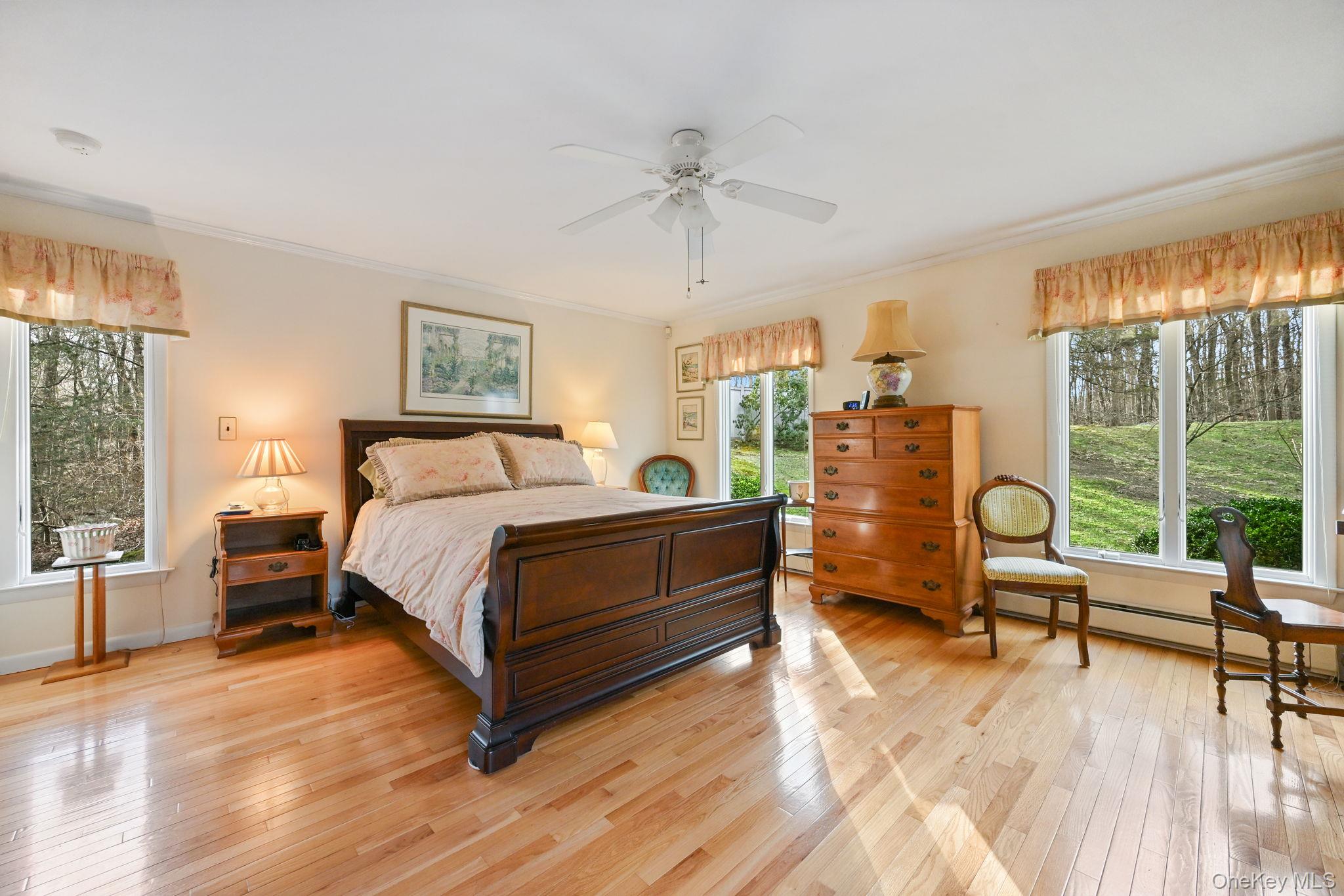 54 Lockwood Road South Salem, NY 10590 - Photo 22 of 46 a bed room with a bed and a chair