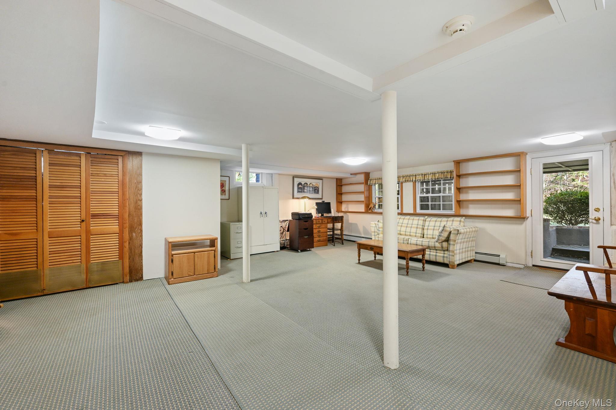 54 Lockwood Road South Salem, NY 10590 - Photo 34 of 46 a view of a livingroom with furniture and a window