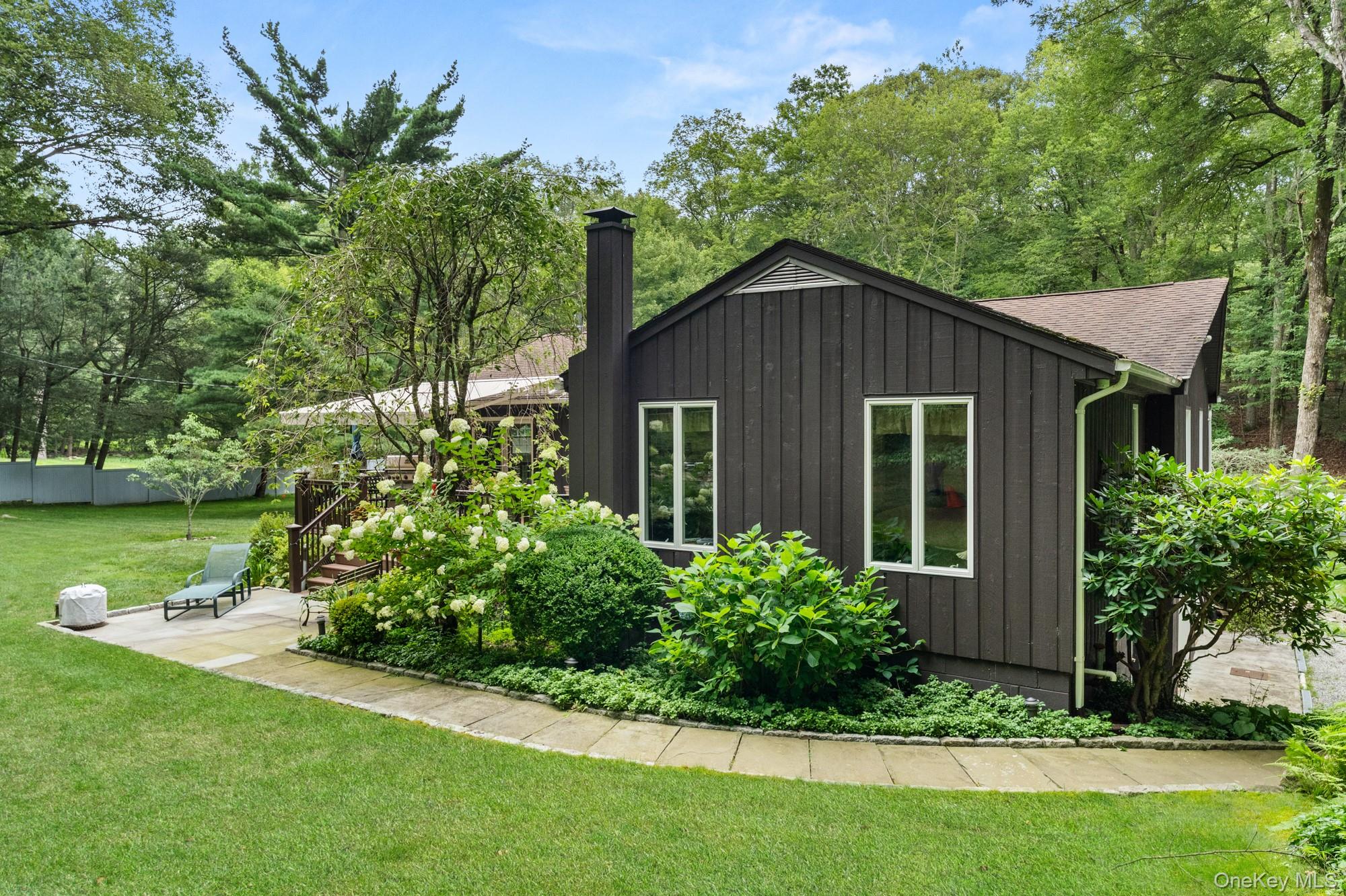 54 Lockwood Road South Salem, NY 10590 - Photo 41 of 46 a front view of a house with garden