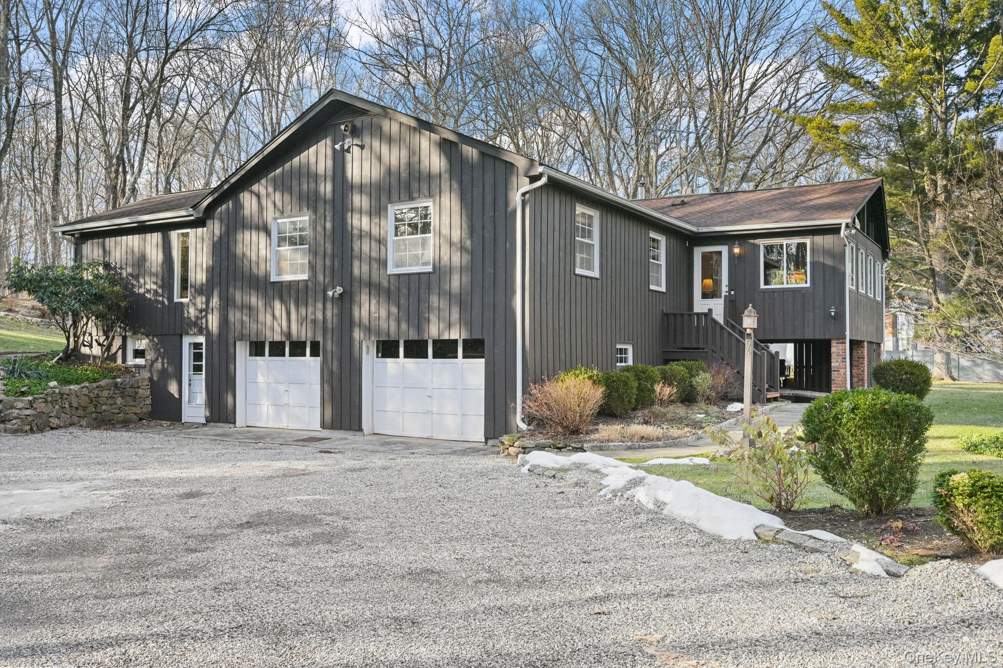 54 Lockwood Road South Salem, NY 10590 - Photo 6 of 46 a front view of a house with yard and tree s