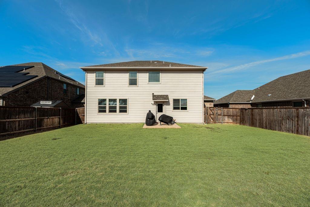 1620 Berry Rdg Trail Aubrey, TX 76227 - Photo 24 of 33 a view of a house with backyard