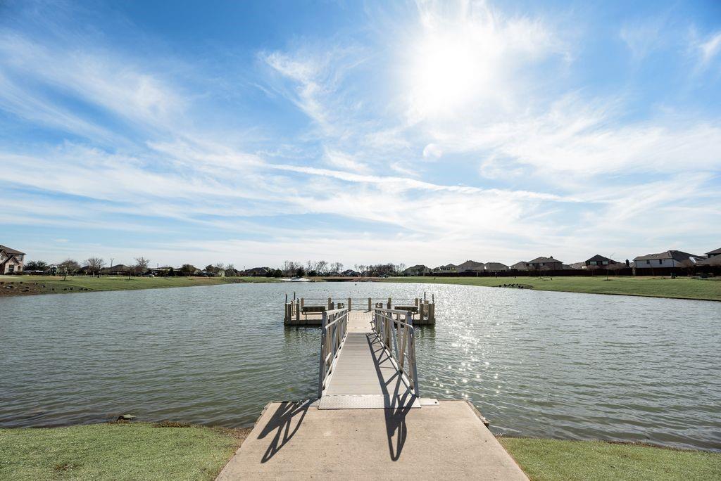1620 Berry Rdg Trail Aubrey, TX 76227 - Photo 30 of 33 a view of a lake with a lake