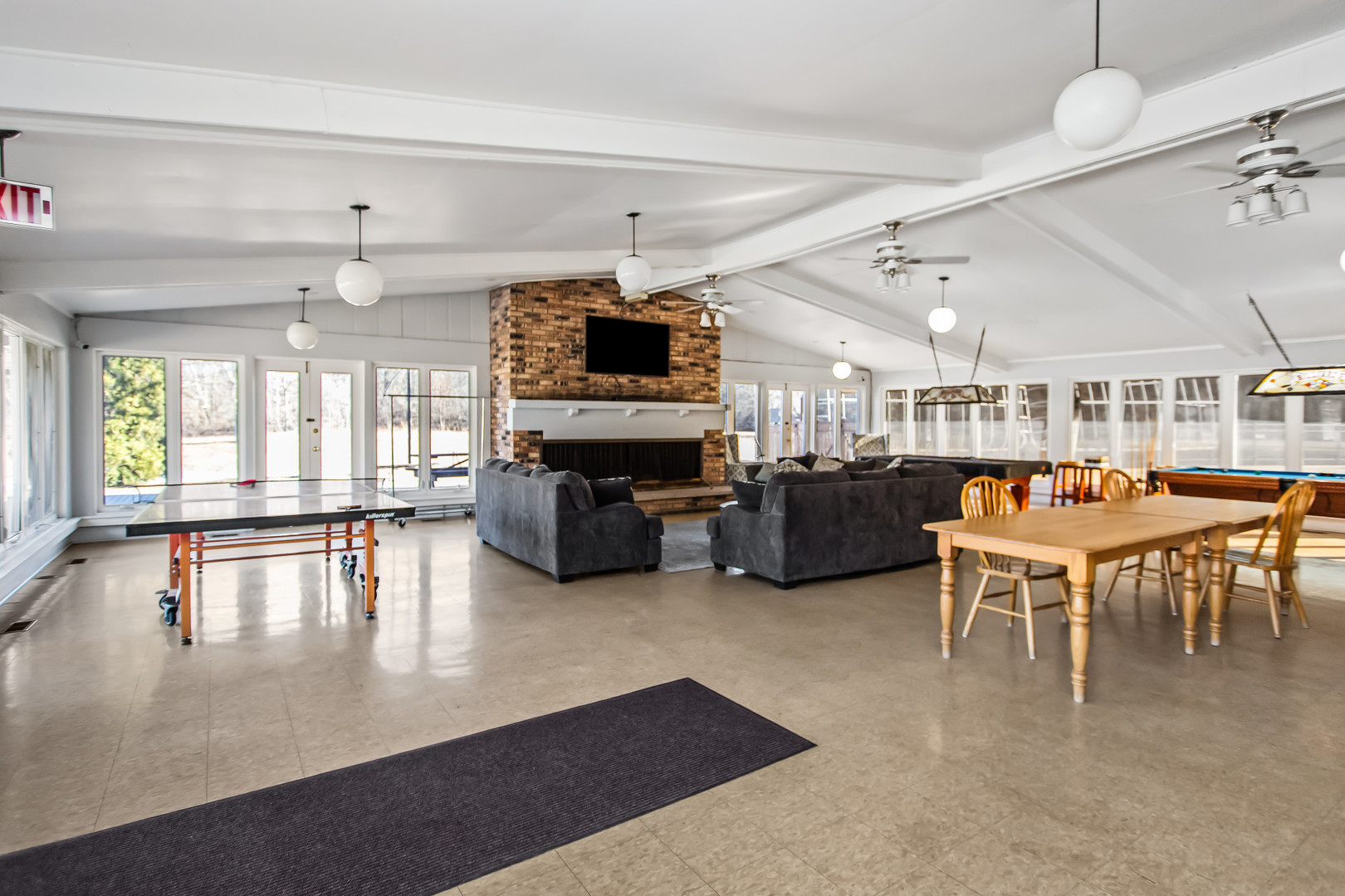 55 Vail Colony, Unit 6 Fox Lake, IL 60020 - Photo 14 of 23 a living room with lots of furniture and a flat screen tv