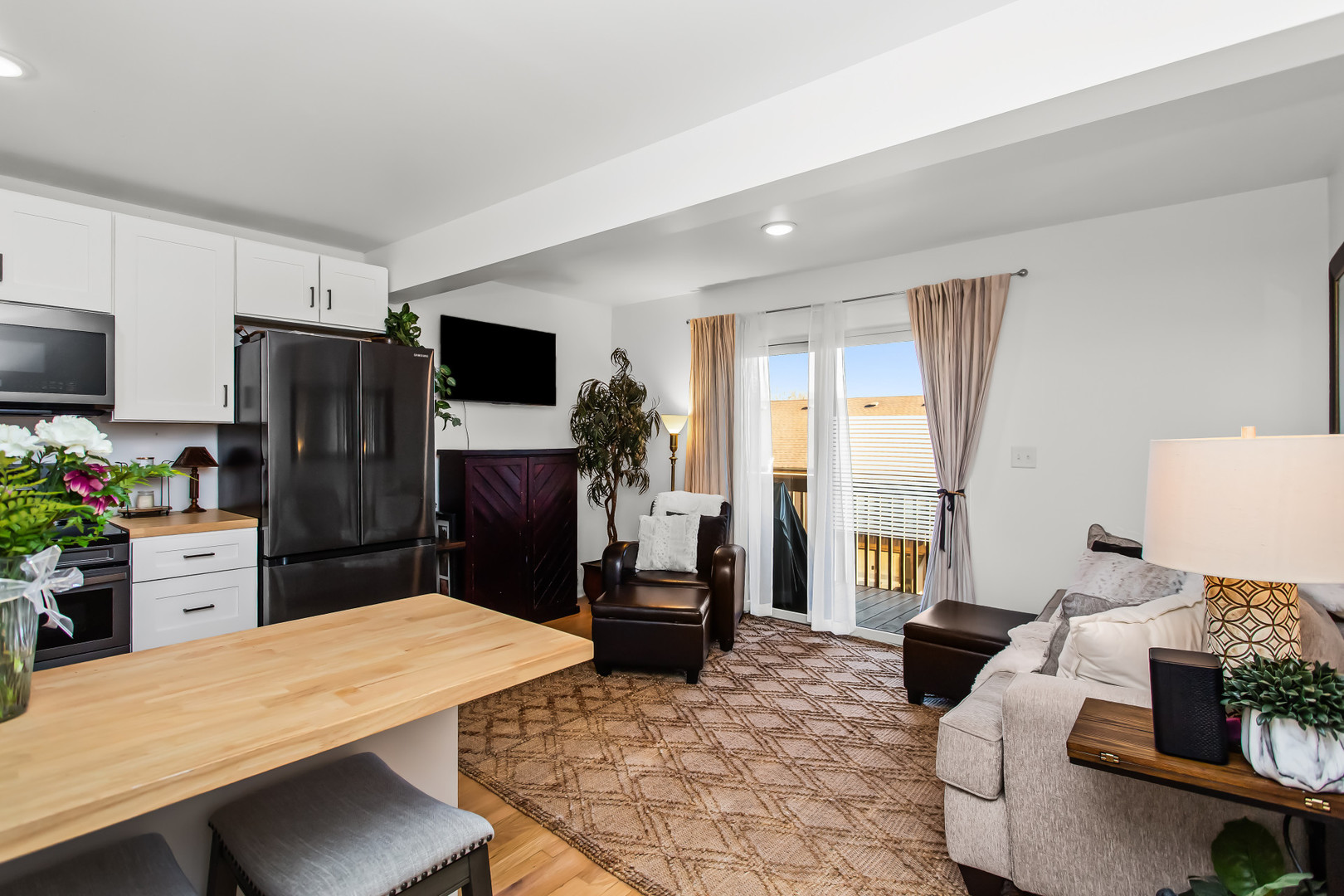 55 Vail Colony, Unit 6 Fox Lake, IL 60020 - Photo 5 of 23 a kitchen with a refrigerator and a stove top oven