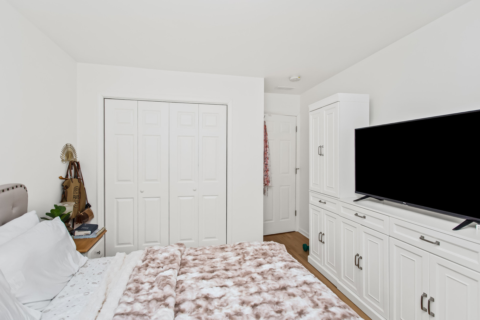 55 Vail Colony, Unit 6 Fox Lake, IL 60020 - Photo 8 of 23 a bedroom with bed and flat tv screen