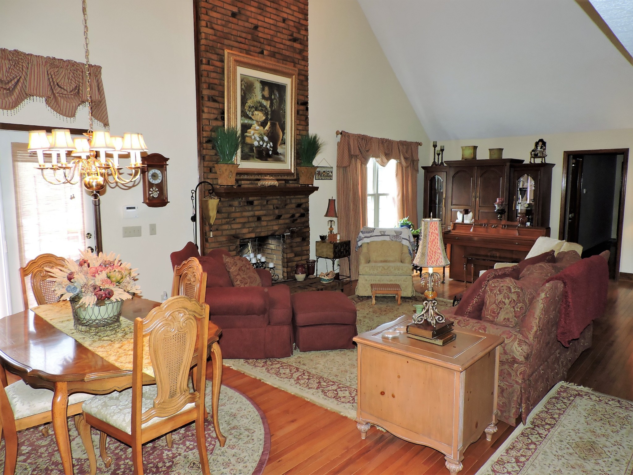 3581 Franklin Road Lebanon, TN 37090 - Photo 20 of 42 a living room with furniture a fireplace and a table