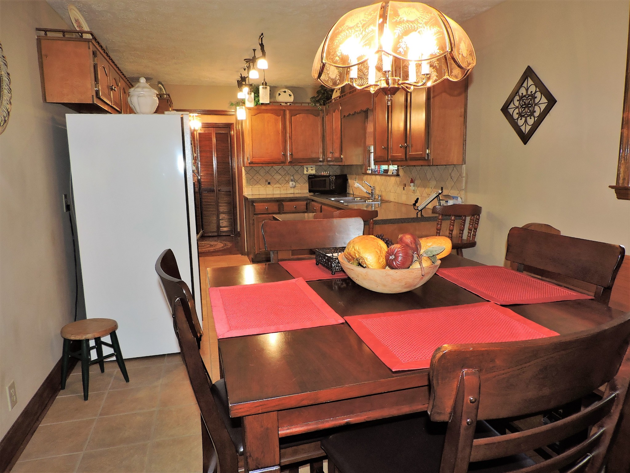 3581 Franklin Road Lebanon, TN 37090 - Photo 22 of 42 a view of a dining room with furniture and a chandelier