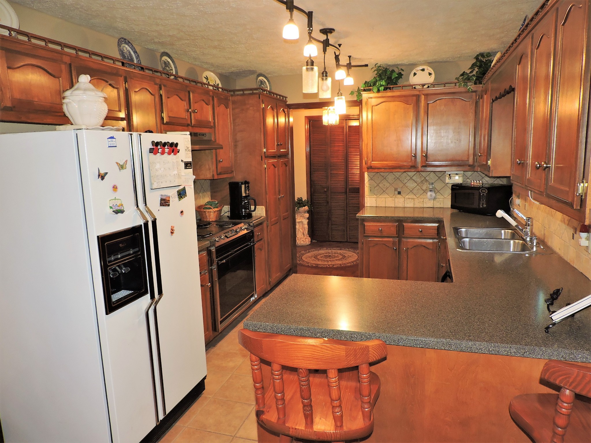3581 Franklin Road Lebanon, TN 37090 - Photo 23 of 42 a kitchen with refrigerator and stove
