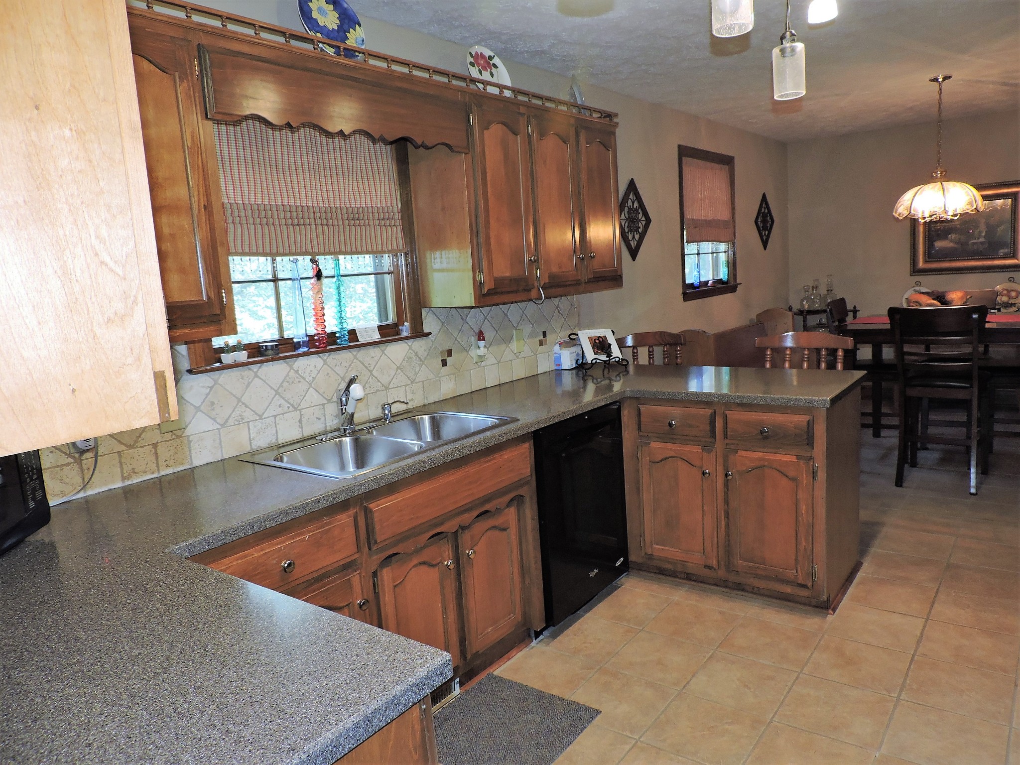 3581 Franklin Road Lebanon, TN 37090 - Photo 24 of 42 a kitchen with stainless steel appliances granite countertop a sink stove and cabinets