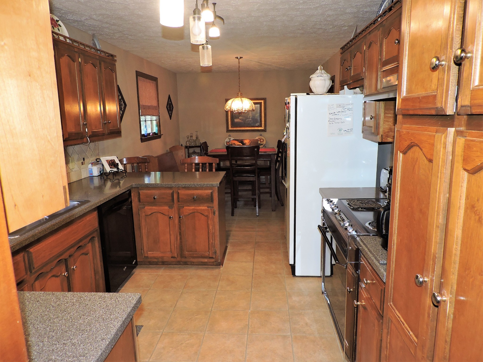 3581 Franklin Road Lebanon, TN 37090 - Photo 25 of 42 a kitchen with refrigerator and cabinets