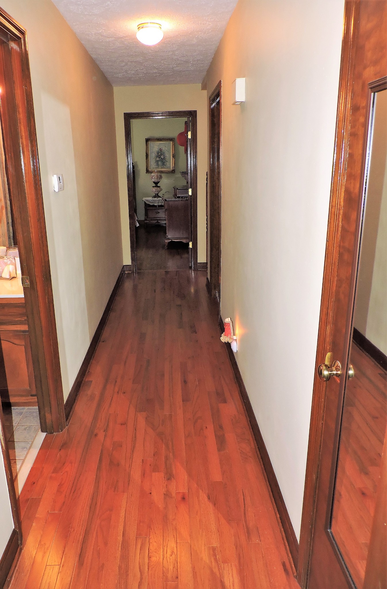 3581 Franklin Road Lebanon, TN 37090 - Photo 31 of 42 a view of a hallway with wooden floor and staircase