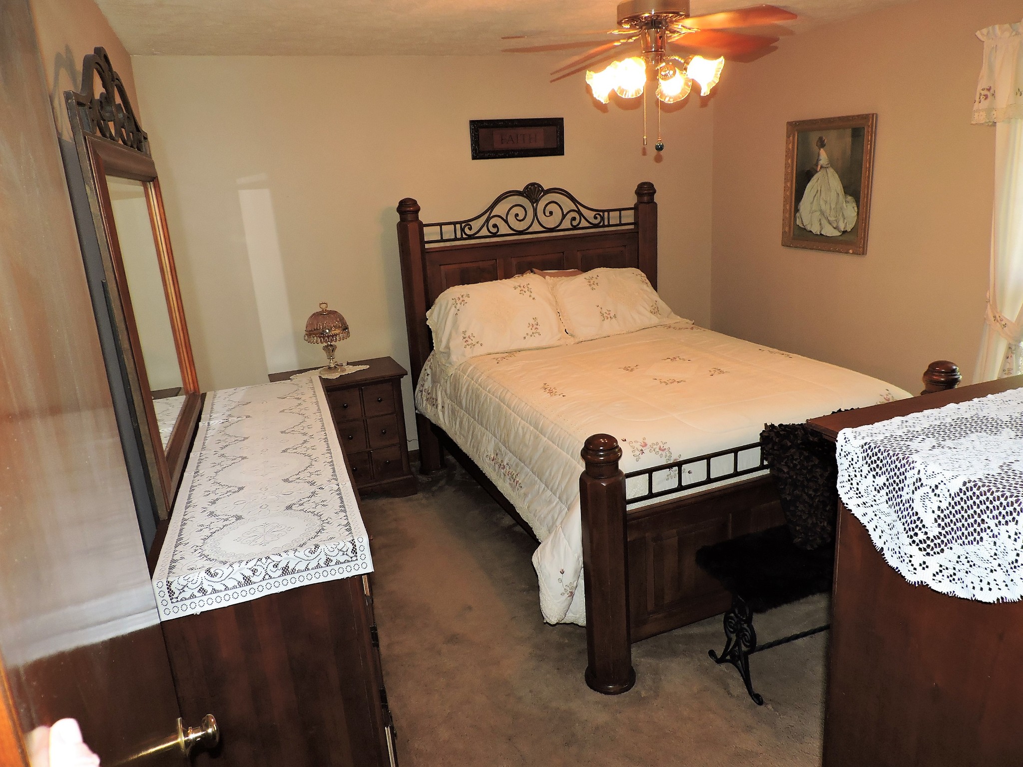 3581 Franklin Road Lebanon, TN 37090 - Photo 34 of 42 a bed sitting in a bedroom and a mirror