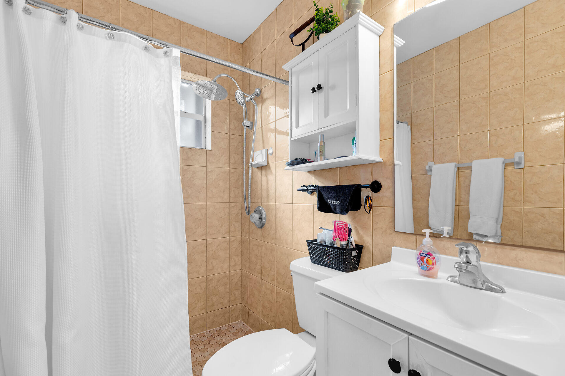 1119 Simonton Street, Unit A1 Key West, FL 33040 - Photo 13 of 18 a bathroom with a sink toilet and shower
