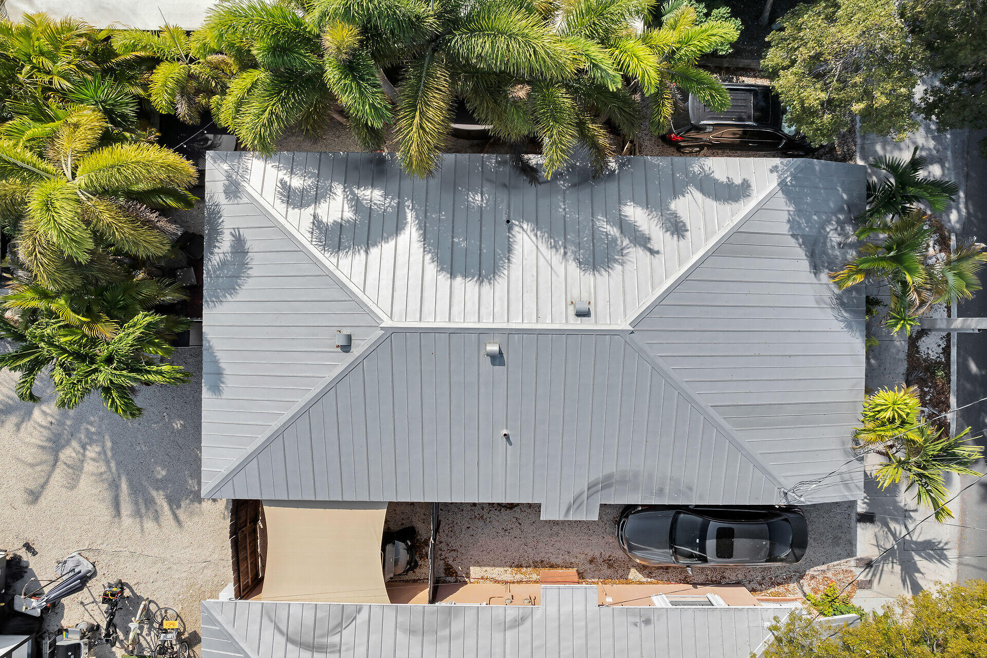 1119 Simonton Street, Unit A1 Key West, FL 33040 - Photo 2 of 18 a backyard of a house with outdoor seating