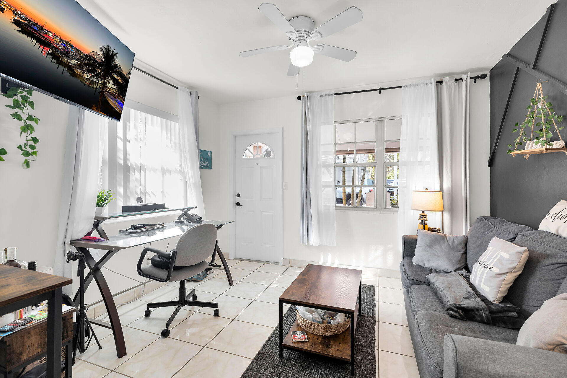 1119 Simonton Street, Unit A1 Key West, FL 33040 - Photo 6 of 18 a living room with furniture and a window