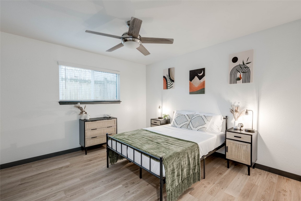 412 West Alpine Road, Unit 1 Austin, TX 78704 - Photo 1 of 1 a bedroom with a bed and a dresser