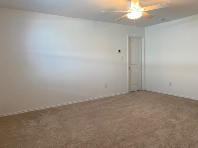 3232 Peyton Lila Road Dallas, TX 75212 - Photo 9 of 17 an empty room with a fan and a fan