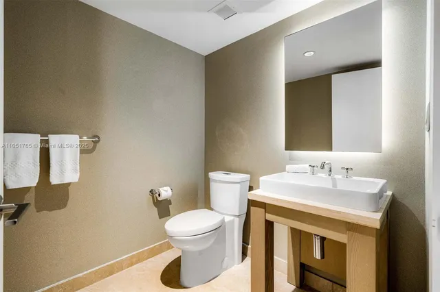 a bathroom with a sink and a toilet