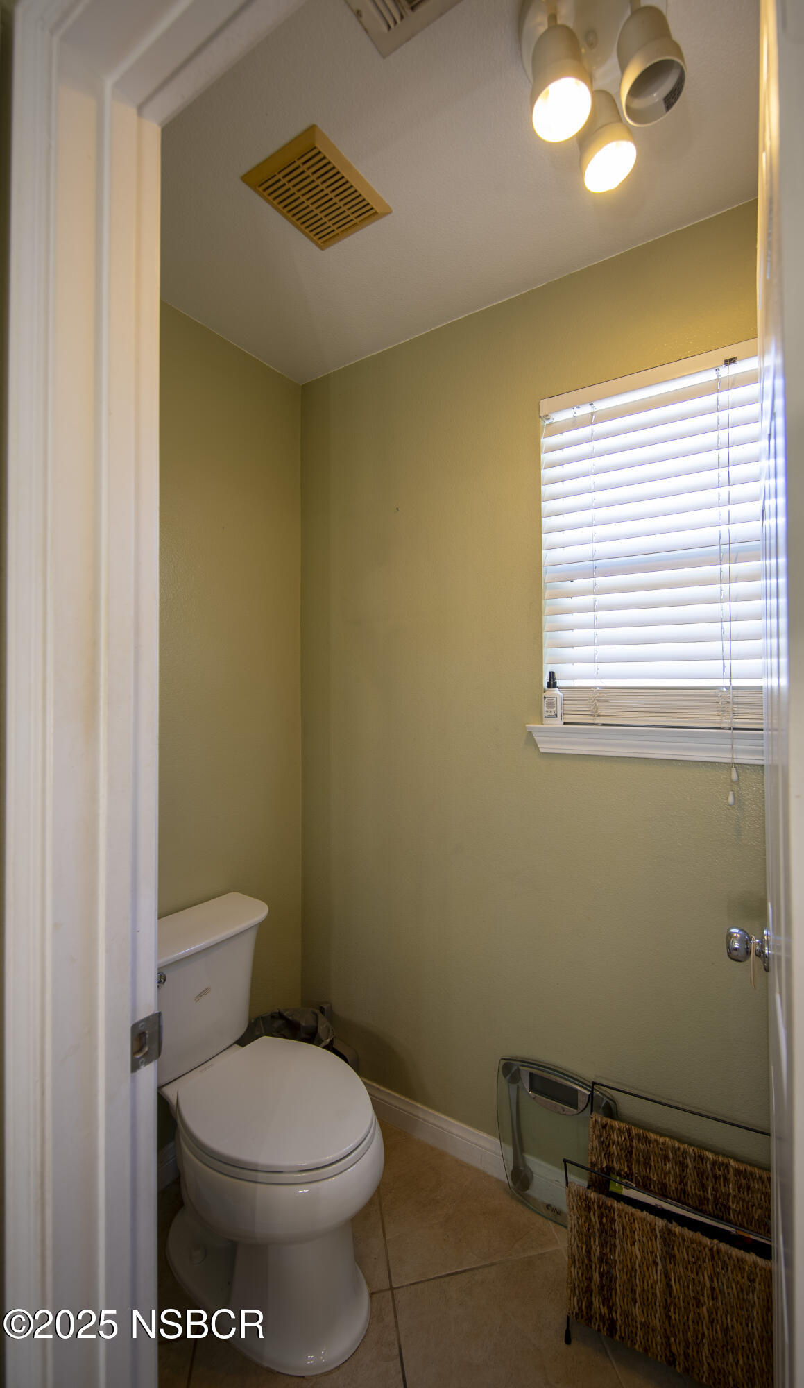 2324 Carrizo Lompoc, CA 93436 - Photo 29 of 62 a bathroom with a toilet and a vanity